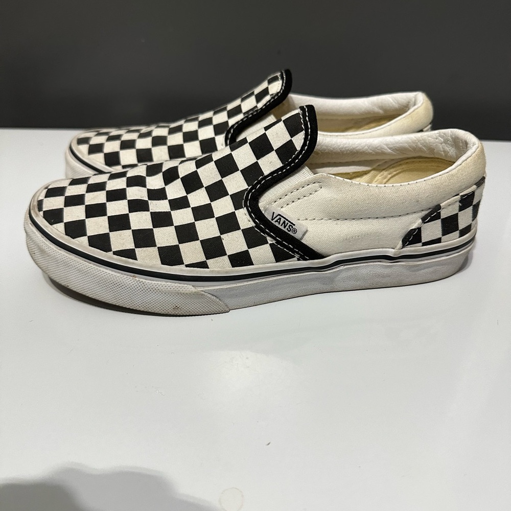 Vans checkered slip ons